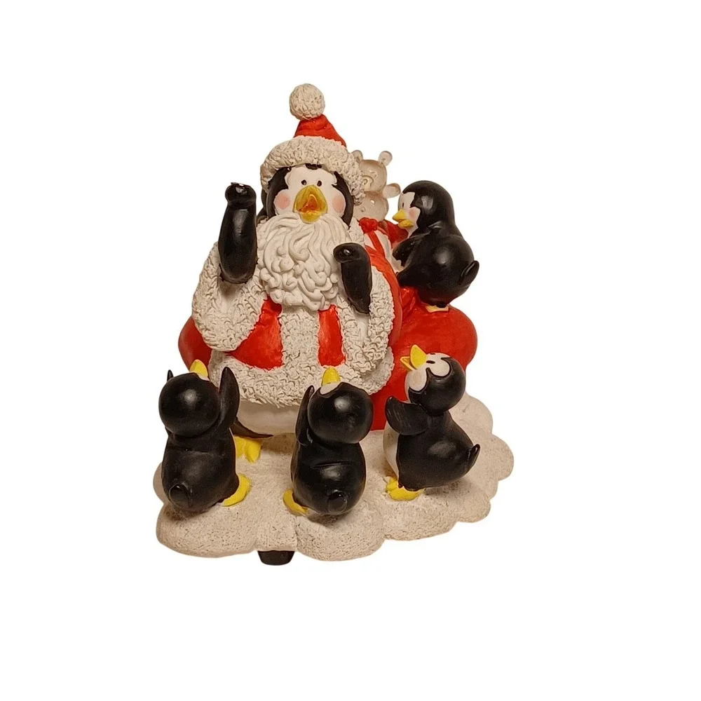 House of Lloyd Penguin Santa Figurine Music Box Plays Let it Snow  Works Great!!